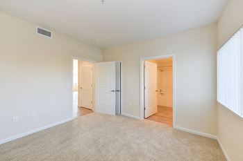 Master bedroom with large window